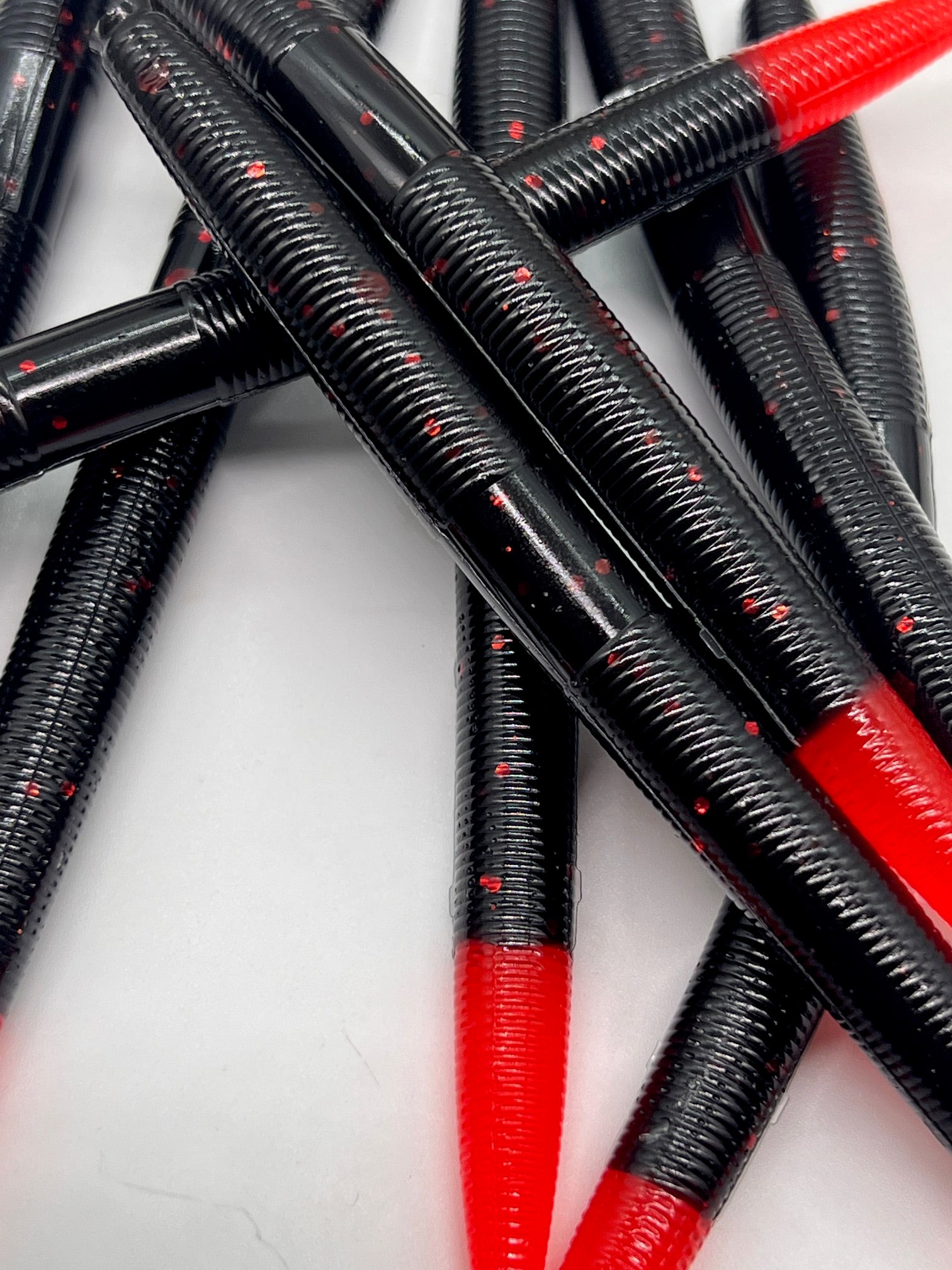 5 inch Black with Red Flake and a Bright Red tail qty 8 per pack